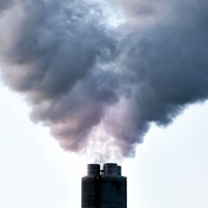 smoke coming out of four chimney flues in one masonry chimney